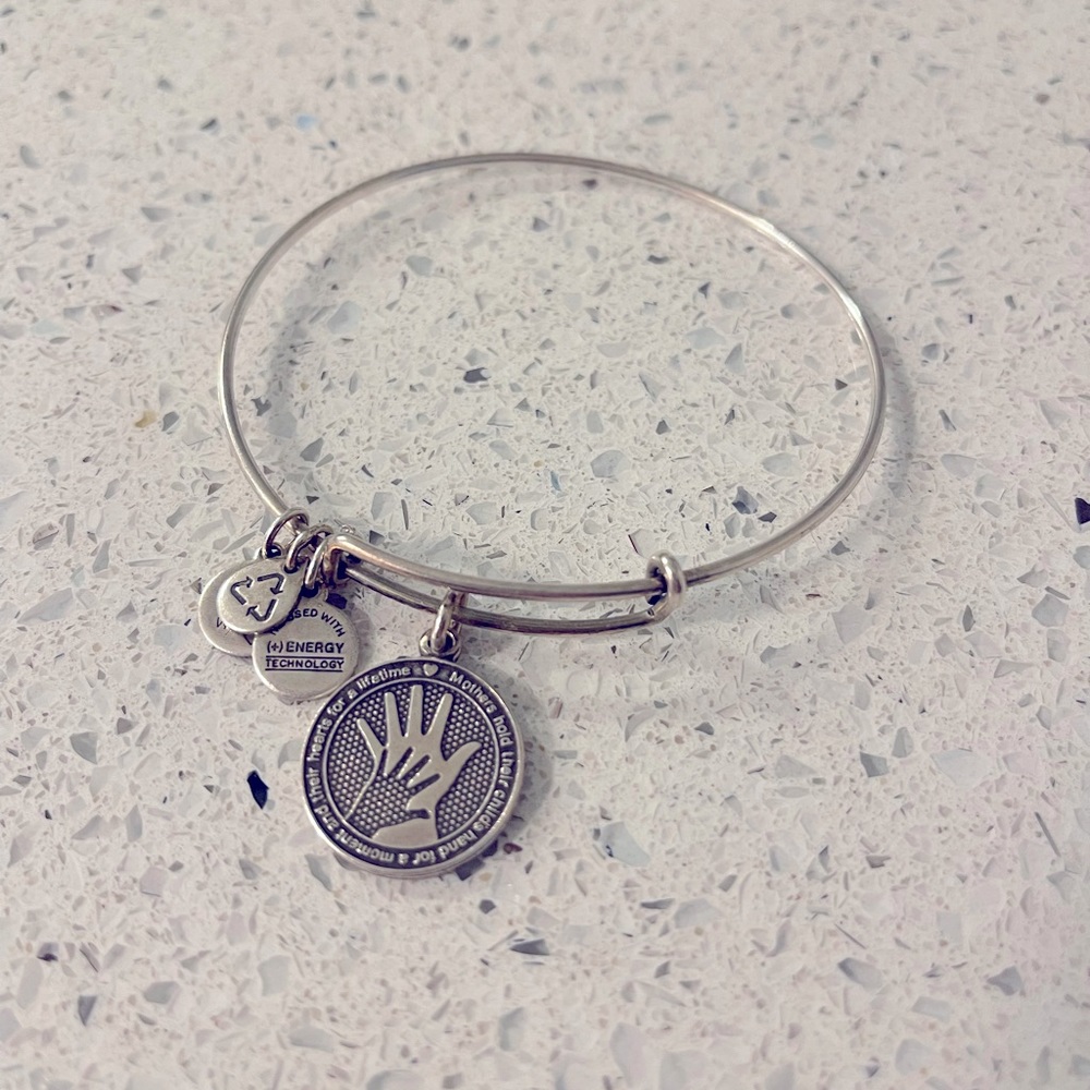 Mother’s hand Alex and Ami bengal bracelet